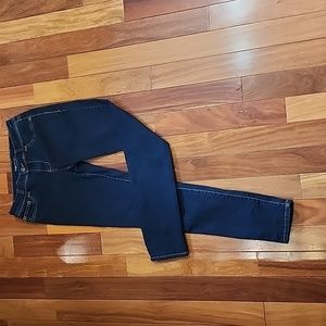 Women's dark wash jeans.